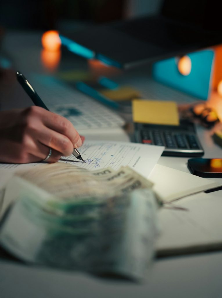 Signing Financial Document Polish Money Contract Deal. Vertical close-up male hand pen signing